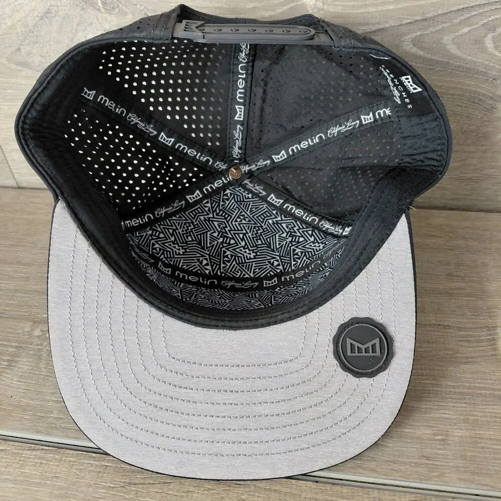 Melin Trenches Icon Hydro Snapback Hat Cap Black Performance Baseball Golf Hat